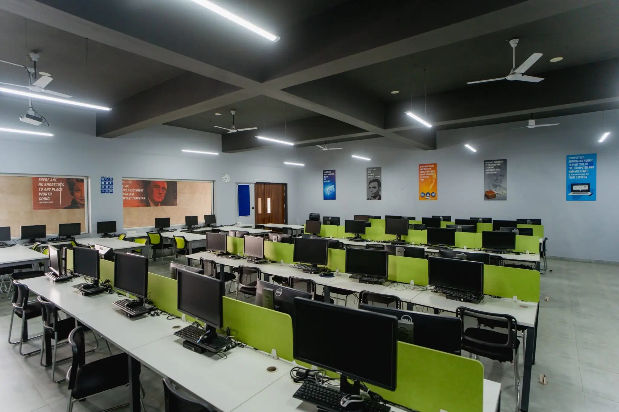 Modern computer lab with advanced systems and spacious workstations at a top MBA college in Bangalore, designed for analytics, research and digital learning.